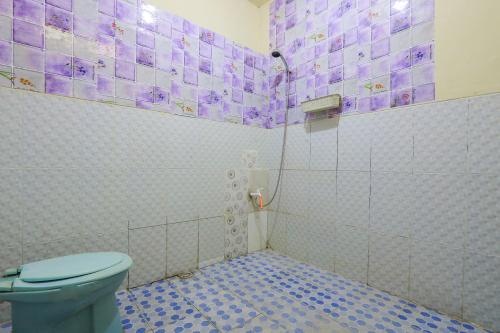 Koupelna v ubytování OYO 2497 Pesona Guest House
