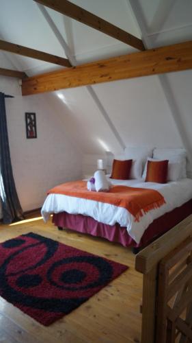 Postel nebo postele na pokoji v ubytování White lily