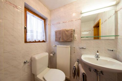 Un baño de Gästehaus Strauss