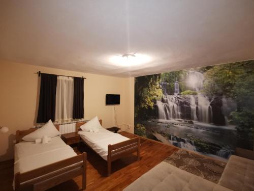 Postel nebo postele na pokoji v ubytování Hotel Gacka