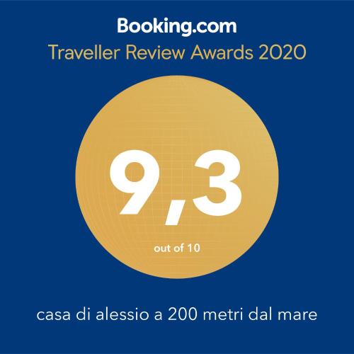 a sign that reads travel review awards with the number nine at casa di alessio a 200 metri dal mare in Acireale