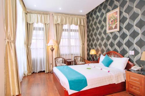 Cama o camas de una habitación en Cong Doan Thanh Binh Hotel