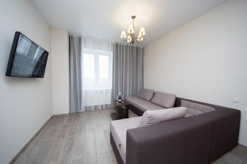 Μια τηλεόραση ή/και κέντρο ψυχαγωγίας στο Stylish Panoramic apartments Dnipro Sail riverside