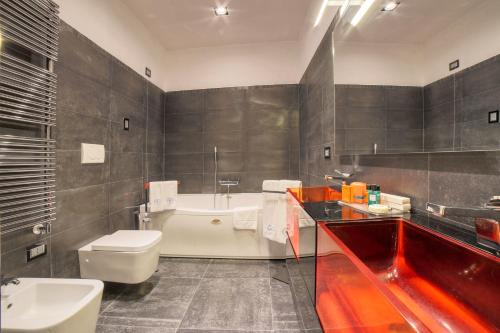 Un baño de Palazzo Confalone
