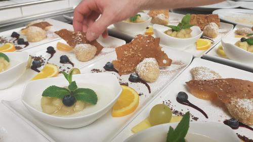 a table filled with different types of desserts at Gasthof Gruber in Fridolfing