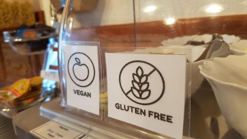 a sign that says gluten free on a window at Hotel Gasperin Bohinj in Bohinj