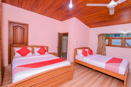 Ένα ή περισσότερα κρεβάτια σε δωμάτιο στο Blue Haven Guest House