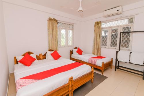 Ένα ή περισσότερα κρεβάτια σε δωμάτιο στο Blue Haven Guest House