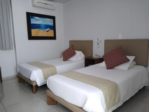 Postel nebo postele na pokoji v ubytování Suites Chapultepec