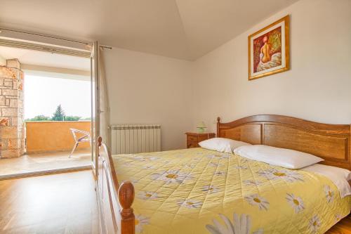 Postel nebo postele na pokoji v ubytování Charming villa Oliva with 4 bedrooms near the wonderful village of Fazana