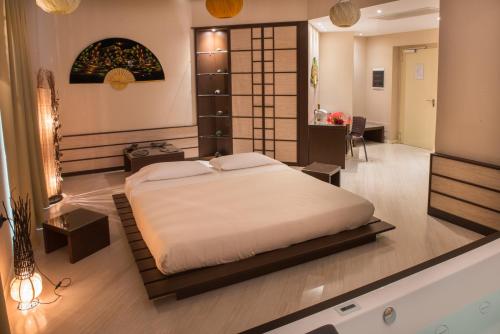 Katil atau katil-katil dalam bilik di Sweet Motel
