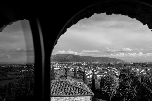 a view of a city from a window at Borgo Antico Casalbosco Holiday Home & Winery in Santomato 
