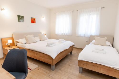 Postel nebo postele na pokoji v ubytování Guest House Ankora