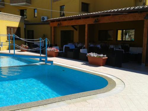 The swimming pool at or close to HOTEL LE PALME