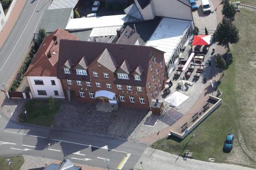 an overhead view of a building in a city at Hotel & Restaurant Gasthaus Zum Anker in Elster