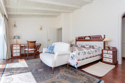 Katil atau katil-katil dalam bilik di Residence Estrela do Mar