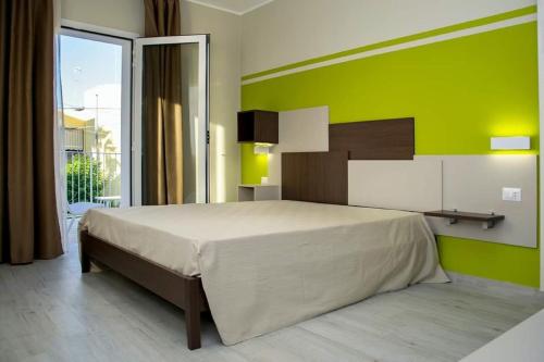 Posteľ alebo postele v izbe v ubytovaní Alisei casa vacanze