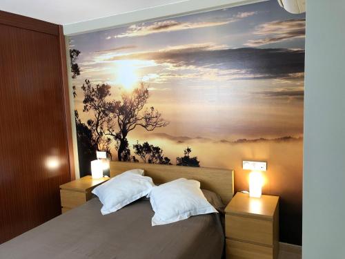 מיטה או מיטות בחדר ב-Ático con terraza y vistas en Carboneras