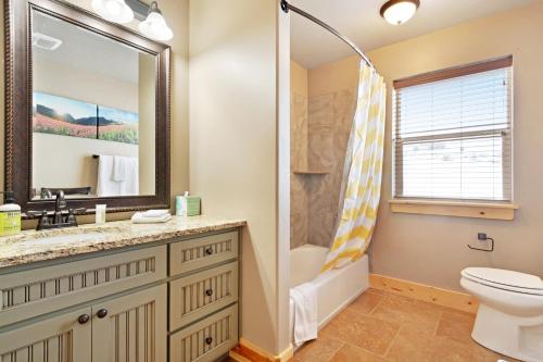 Een badkamer bij Cubbyz Cabin
