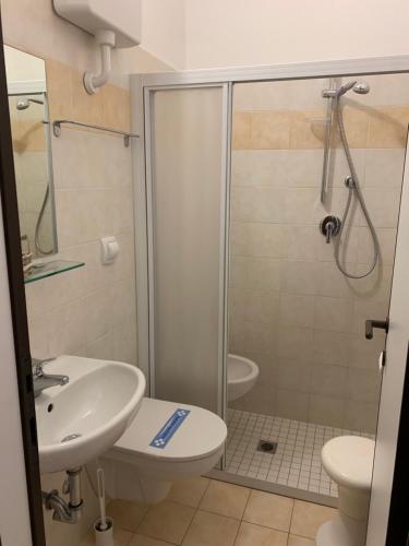 a bathroom with a shower and a sink at Hotel Levante Convenzionato Oltremare e Italia in Miniatura in Riccione