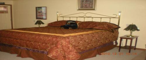 Säng eller sängar i ett rum på Stefan's R&R Resort