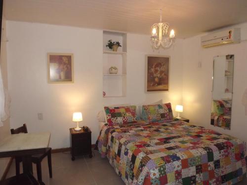 Katil atau katil-katil dalam bilik di Hotel Vivenda Penedo