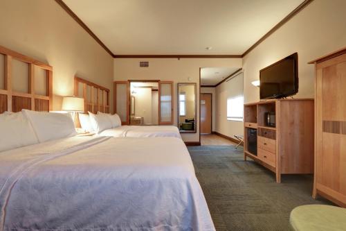 Voodi või voodid majutusasutuse Dimond Center Hotel toas