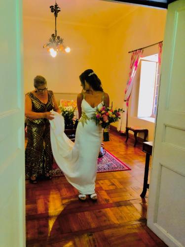 a bride is getting ready for her wedding at Casona Lo Aguirre , Hospedaje de Temporada Cálidas in Talagante