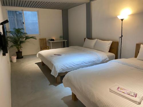 Postel nebo postele na pokoji v ubytování Bao Dao Da Lou