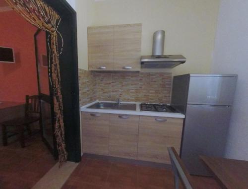 Kuchyň nebo kuchyňský kout v ubytování Villa Terra Nostra