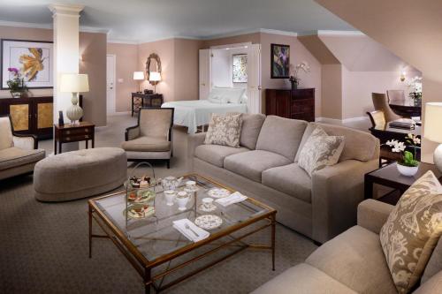 a living room with a couch and a table at Belad Bont Resort in Salalah