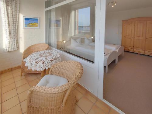 Postel nebo postele na pokoji v ubytování Ferienwohnung *Hafenblick*