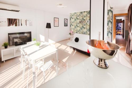 a living room with a large bowl on the floor at My Pretty Payma Apartamentos in Benidorm