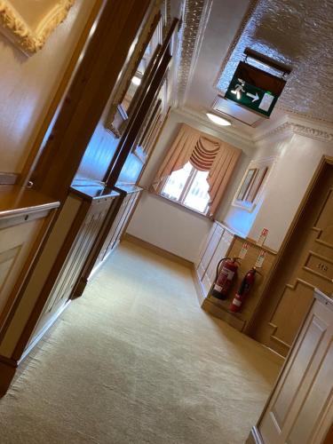 an overhead view of a hallway in a house at Bessemer Hotel in Merthyr Tydfil