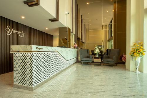 Un lugar para sentarse en SJ Miracle Hotel