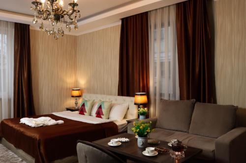 Posezení v ubytování De'Mar Hotel