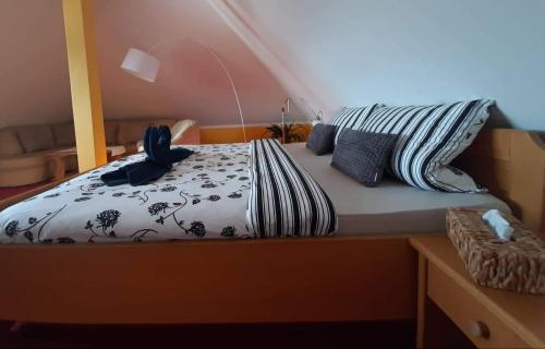 
Postel nebo postele na pokoji v ubytování Penzion Lhotka
