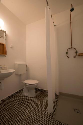 Koupelna v ubytování Plitzner Belvárosi Apartmanház