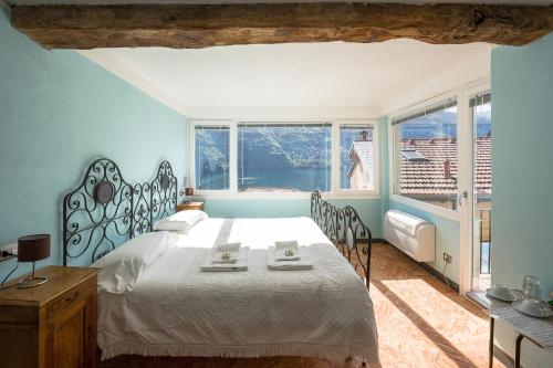 Postel nebo postele na pokoji v ubytování Albergo Diffuso Ca' Spiga