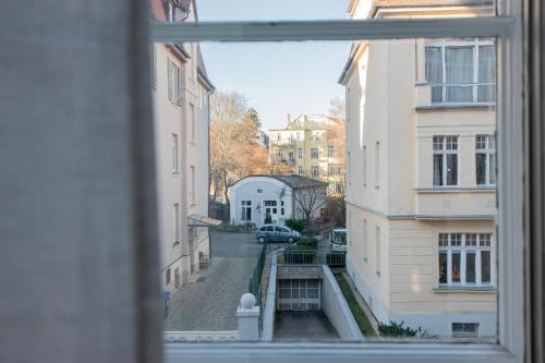 a view from a window of a city street at Modern design im klassischem Altbau in Weimar