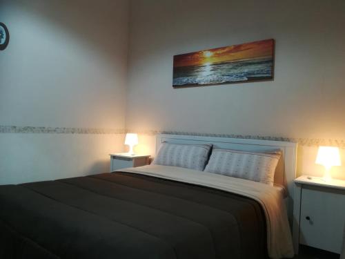 Casa Mia locazione turistica tesisinde bir odada yatak veya yataklar