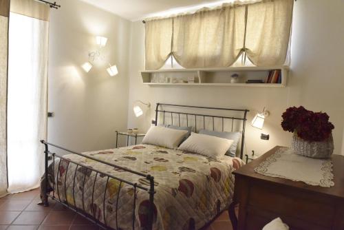 Postel nebo postele na pokoji v ubytování wine apartment le sedici