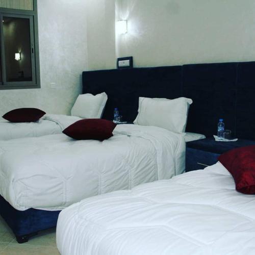 Ένα ή περισσότερα κρεβάτια σε δωμάτιο στο Dakhla Guest