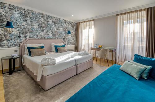 מיטה או מיטות בחדר ב-Hotel Borges Chiado