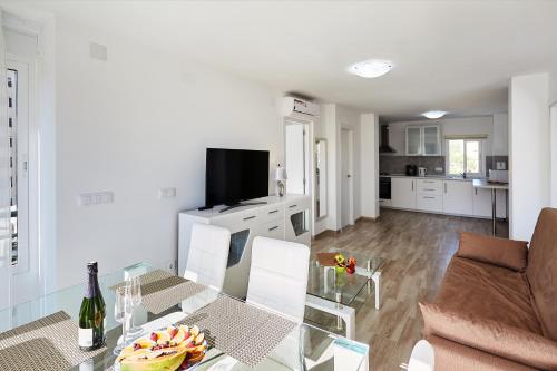 Kuchyň nebo kuchyňský kout v ubytování Sonrisa Apartments