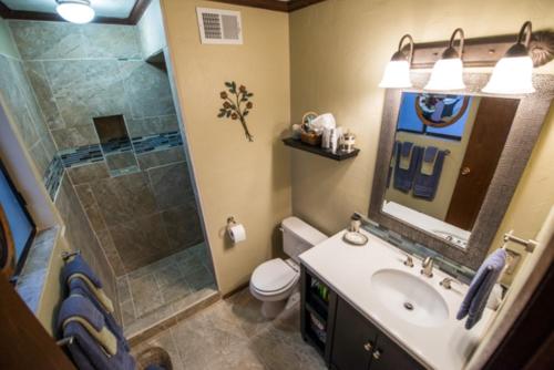 a bathroom with a sink and a shower at Canyon Colors Bed and Breakfast in Page