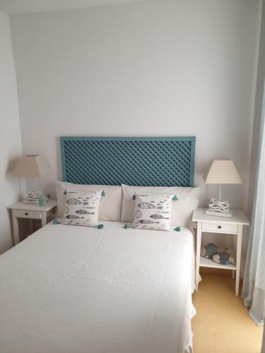Posteľ alebo postele v izbe v ubytovaní Apartamento Conil, perfecta ubicación