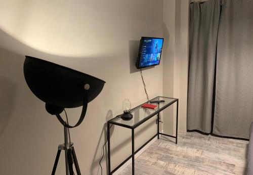 TV a/nebo společenská místnost v ubytování B&B Nonna Marcella