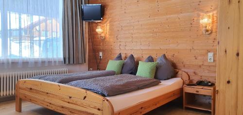 Postel nebo postele na pokoji v ubytování Appartements Burtscher