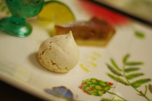 a piece of food sitting on a plate with peas at Villa Yurimun in Tatsugo